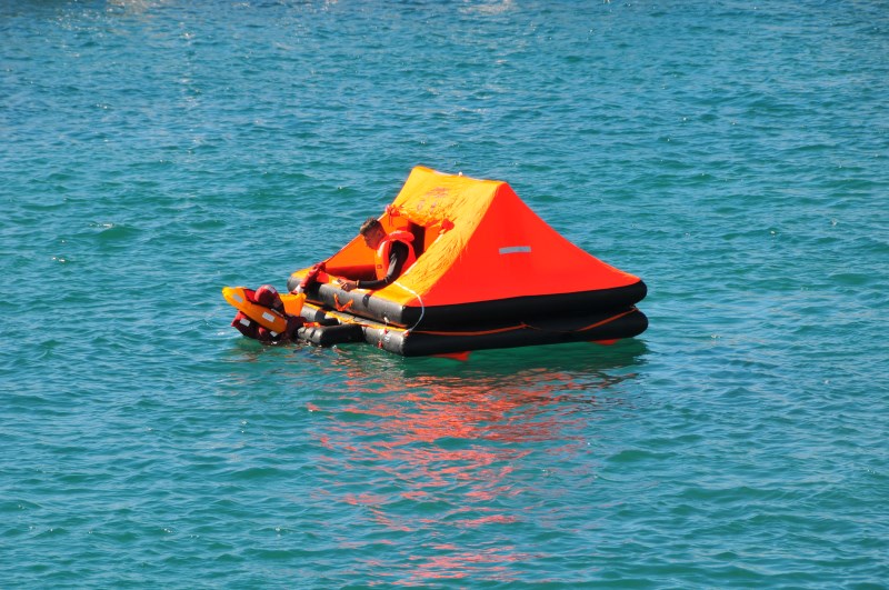 Yacht-Pool Safety at Sea entering life raft at 17th BBS 2015.